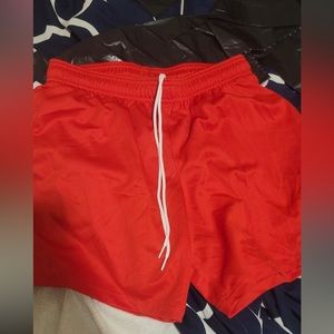 Red Nike shorts